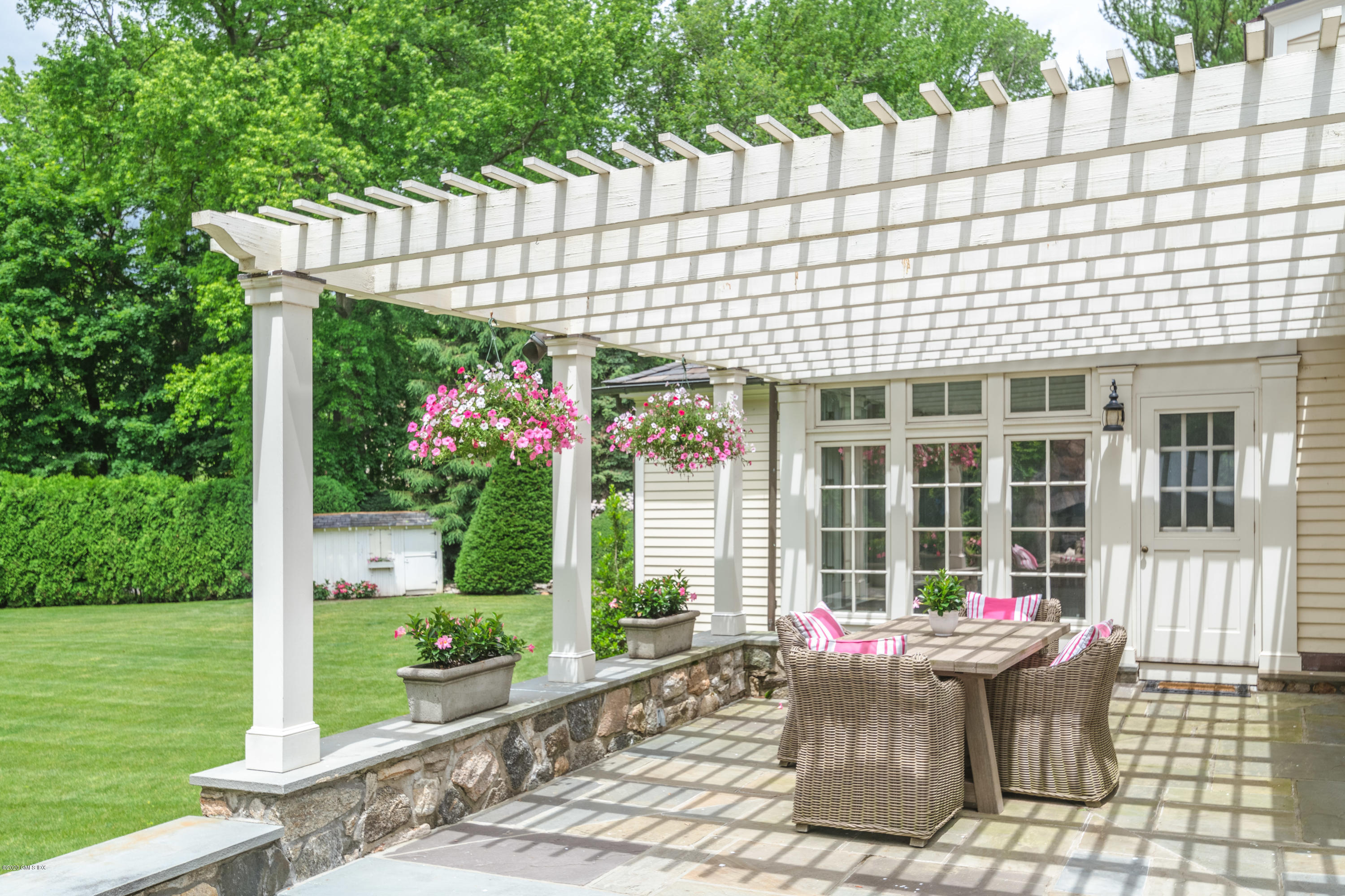 18 Tower Road Riverside, CT 06878 - Photo 18 of 27 a front view of a house with a garden