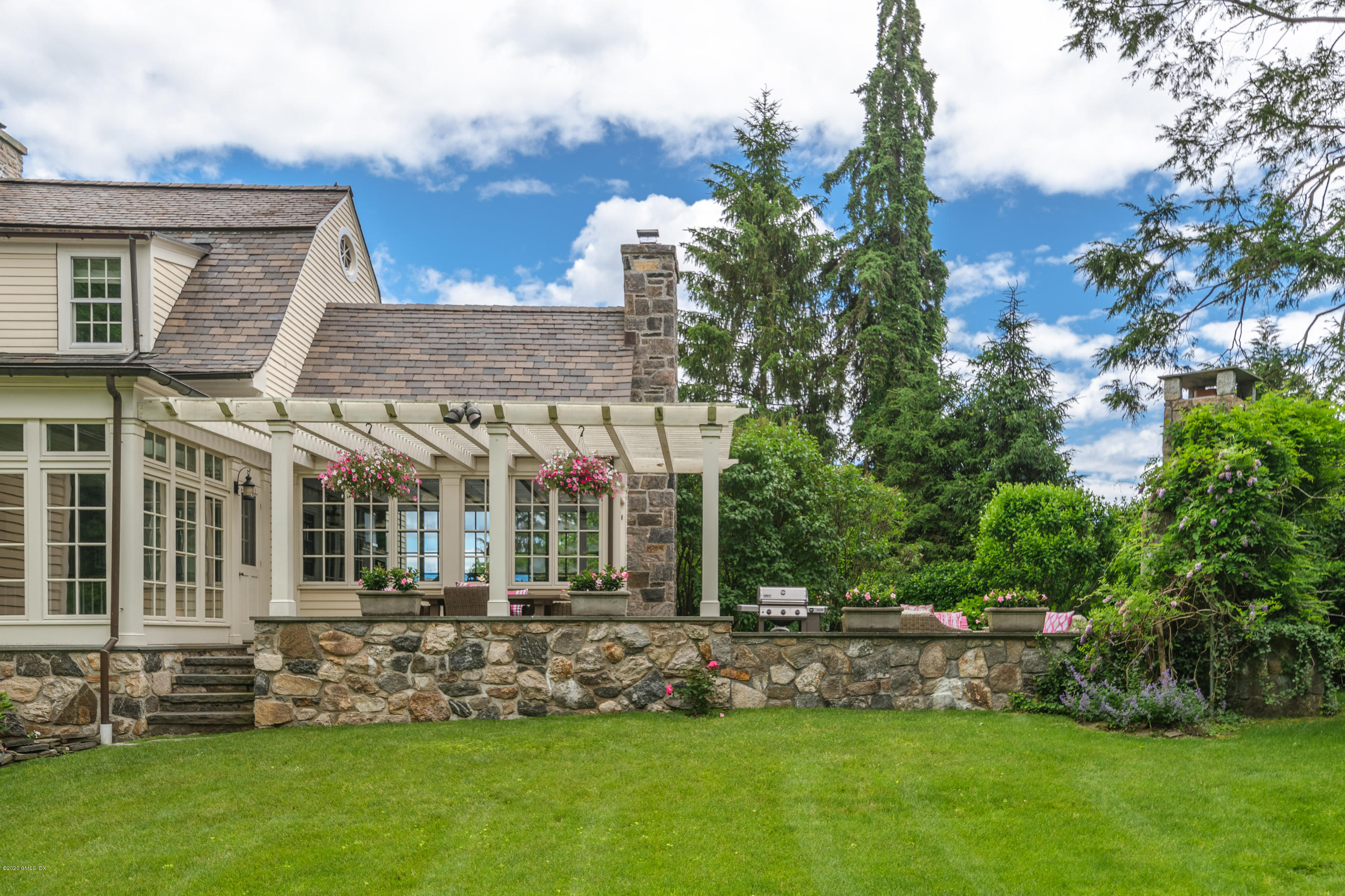 18 Tower Road Riverside, CT 06878 - Photo 19 of 27 a view of house with backyard