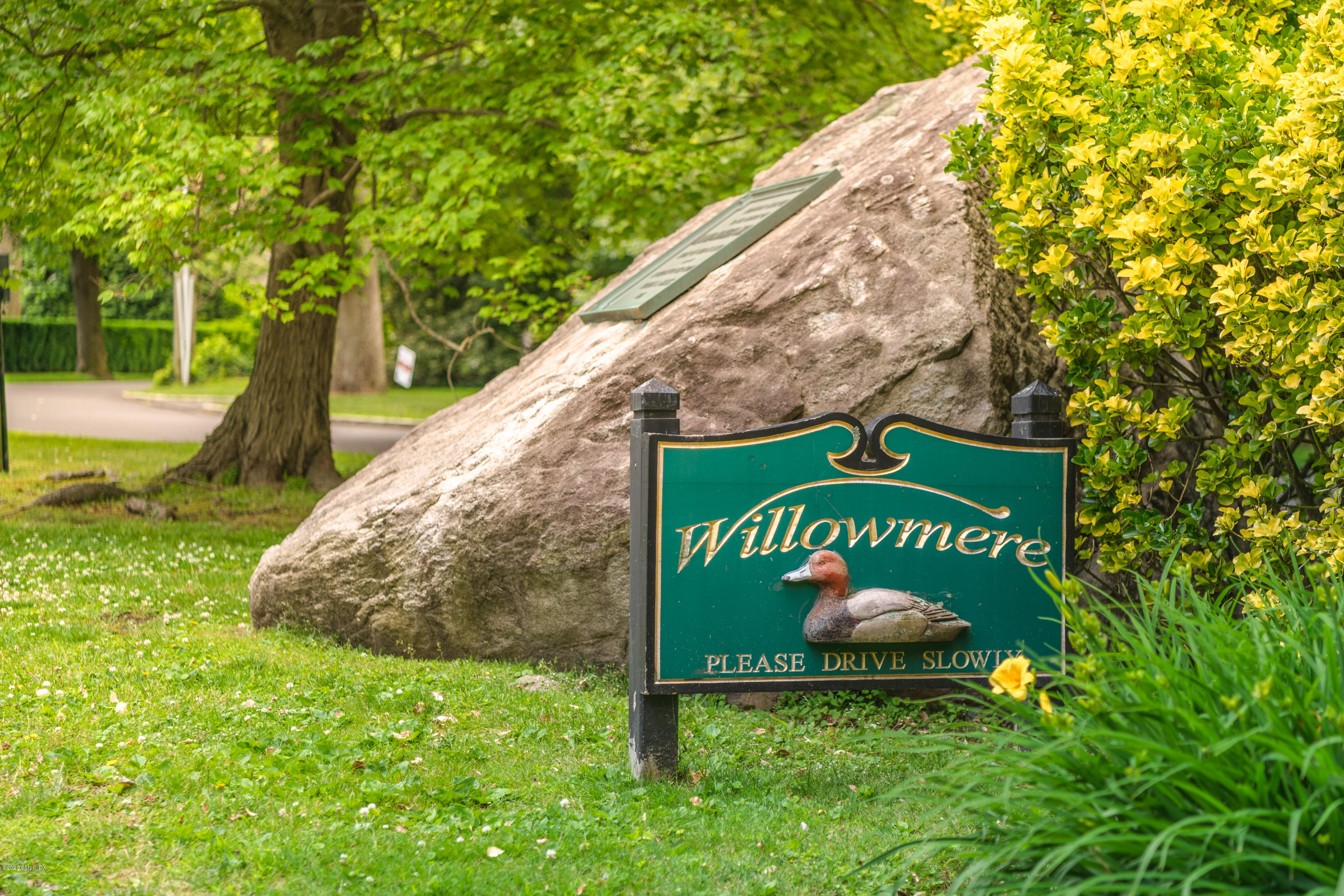 18 Tower Road Riverside, CT 06878 - Photo 23 of 27 a sign that is sitting on a brick wall