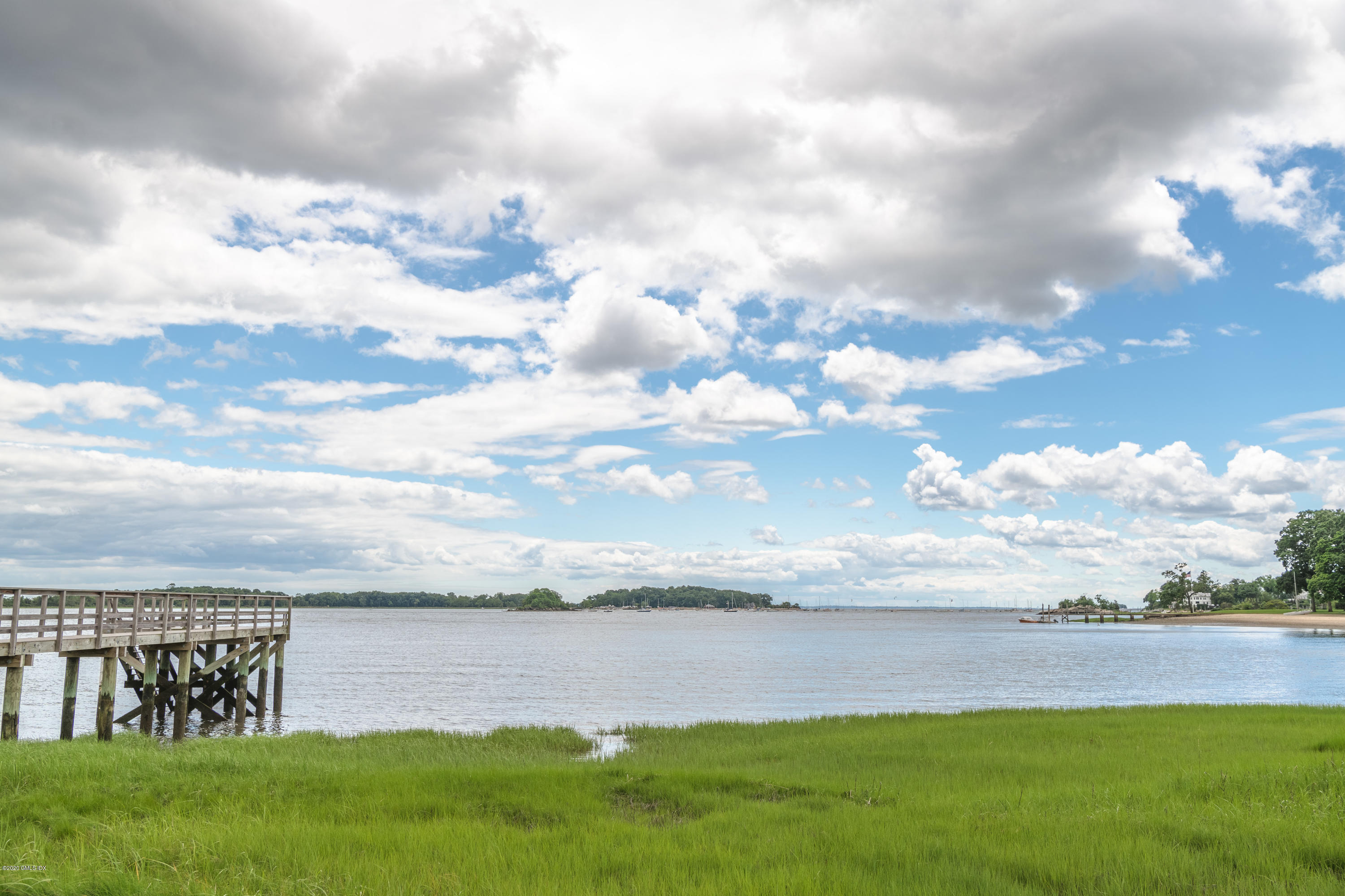 18 Tower Road Riverside, CT 06878 - Photo 26 of 27 a view of a lake and beach