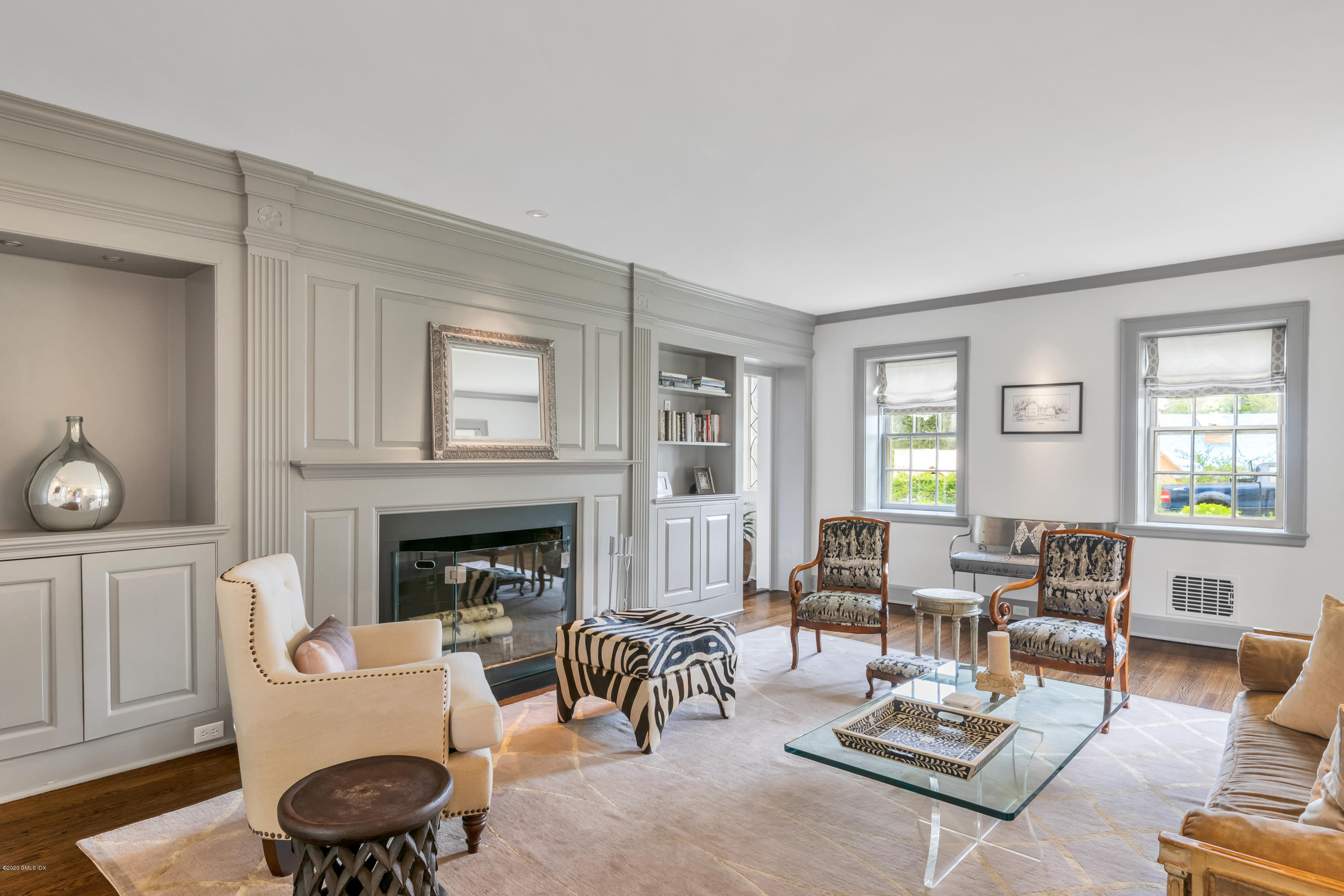 18 Tower Road Riverside, CT 06878 - Photo 3 of 27 a living room with furniture a fireplace and window