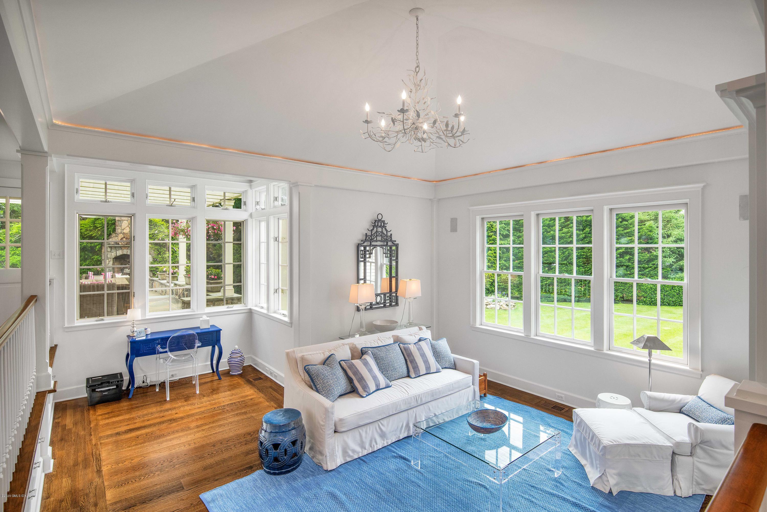 18 Tower Road Riverside, CT 06878 - Photo 6 of 27 a living room with furniture and a chandelier