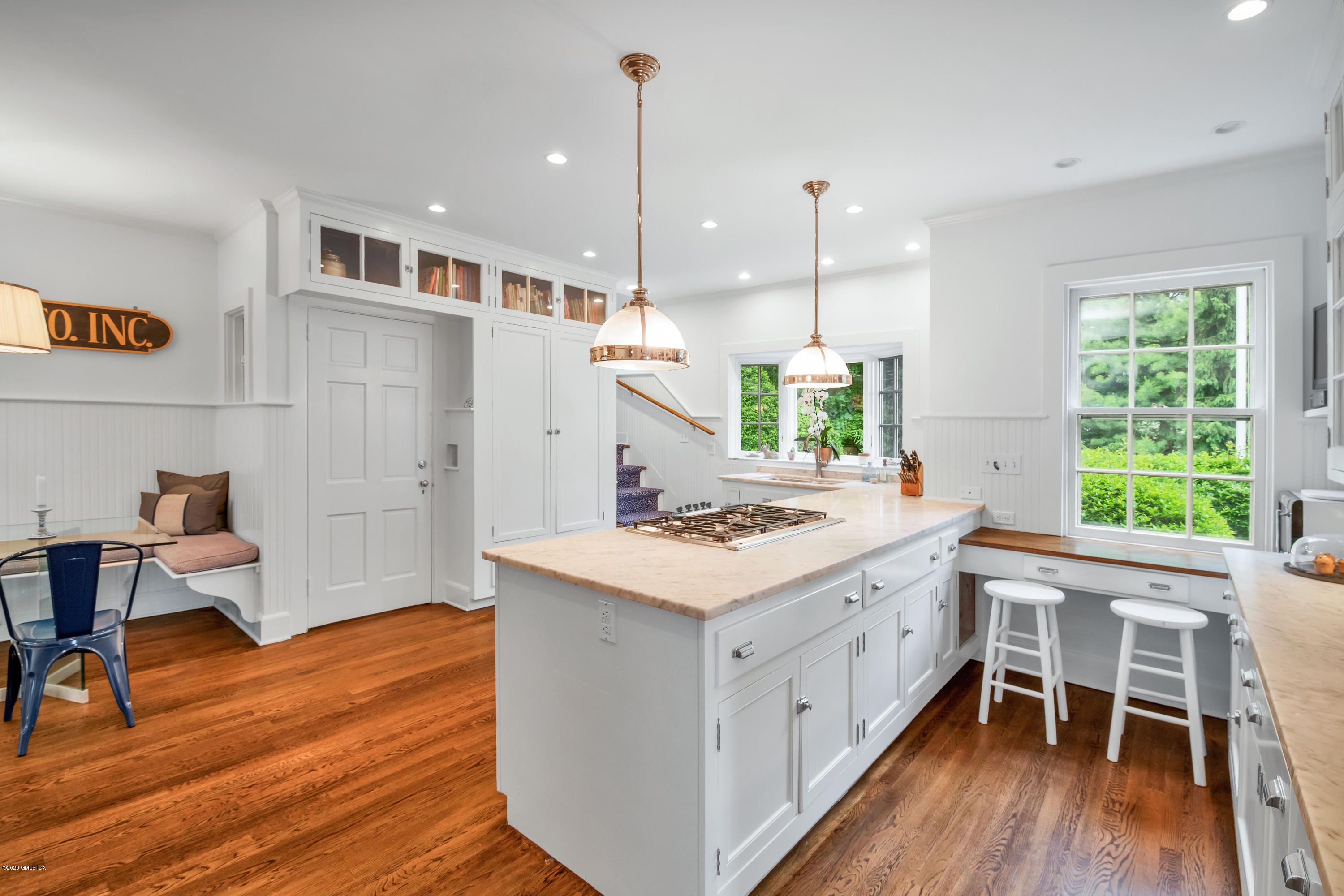 18 Tower Road Riverside, CT 06878 - Photo 9 of 27 a kitchen with a stove and wooden floor