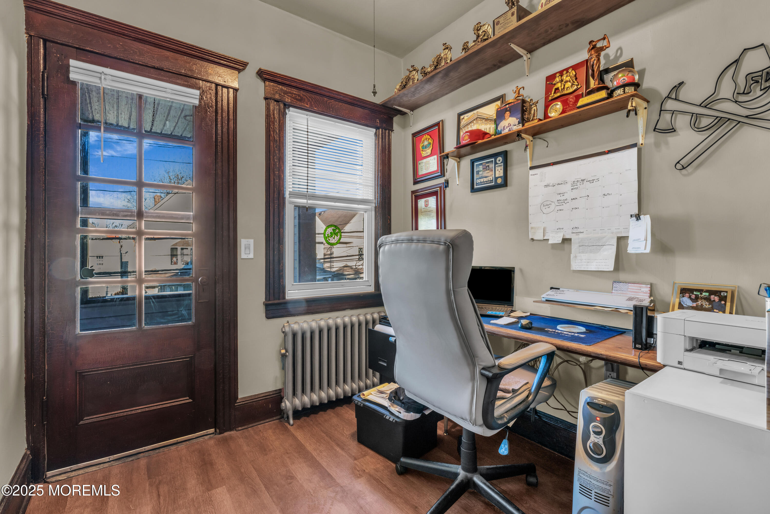 104 West 16th Street Bayonne, NJ 07002 - Photo 21 of 39 a work room with furniture and windows