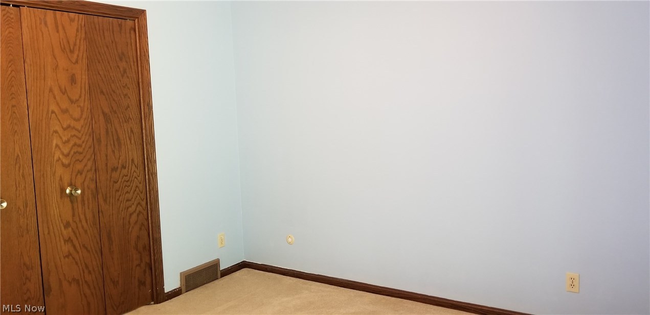 1261 Sand Run Road Akron, OH 44313 - Photo 21 of 32 The second bedroom on this level, just recently painted.