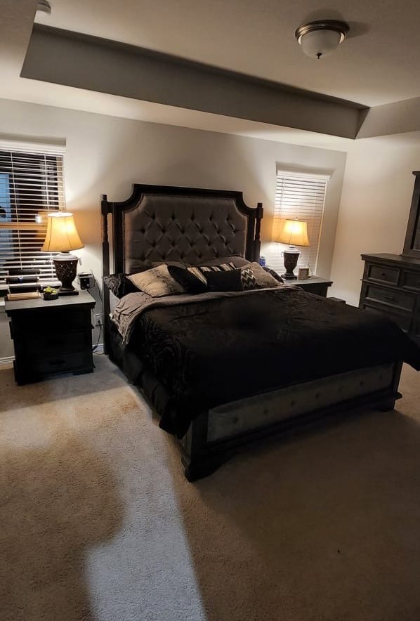 100 Wedgewood Trace Lane La Porte, TX 77571 - Photo 9 of 17 a bedroom with bed lamp and a fireplace