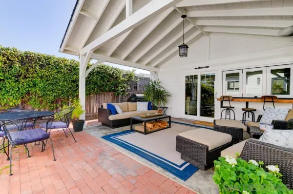 a outdoor living space with furniture and garden view