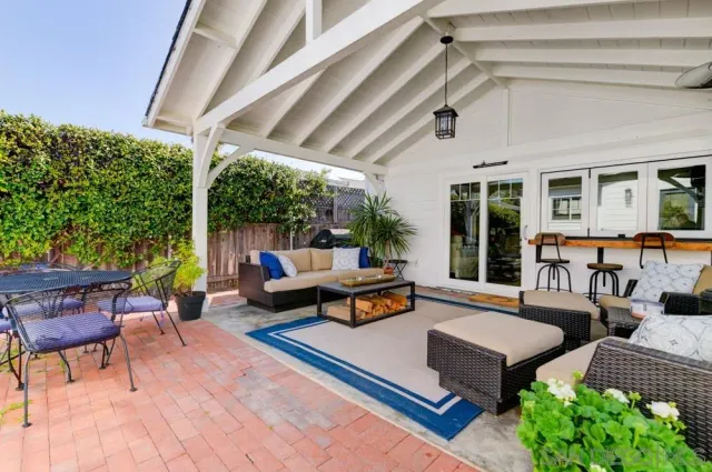 a outdoor living space with furniture and garden view