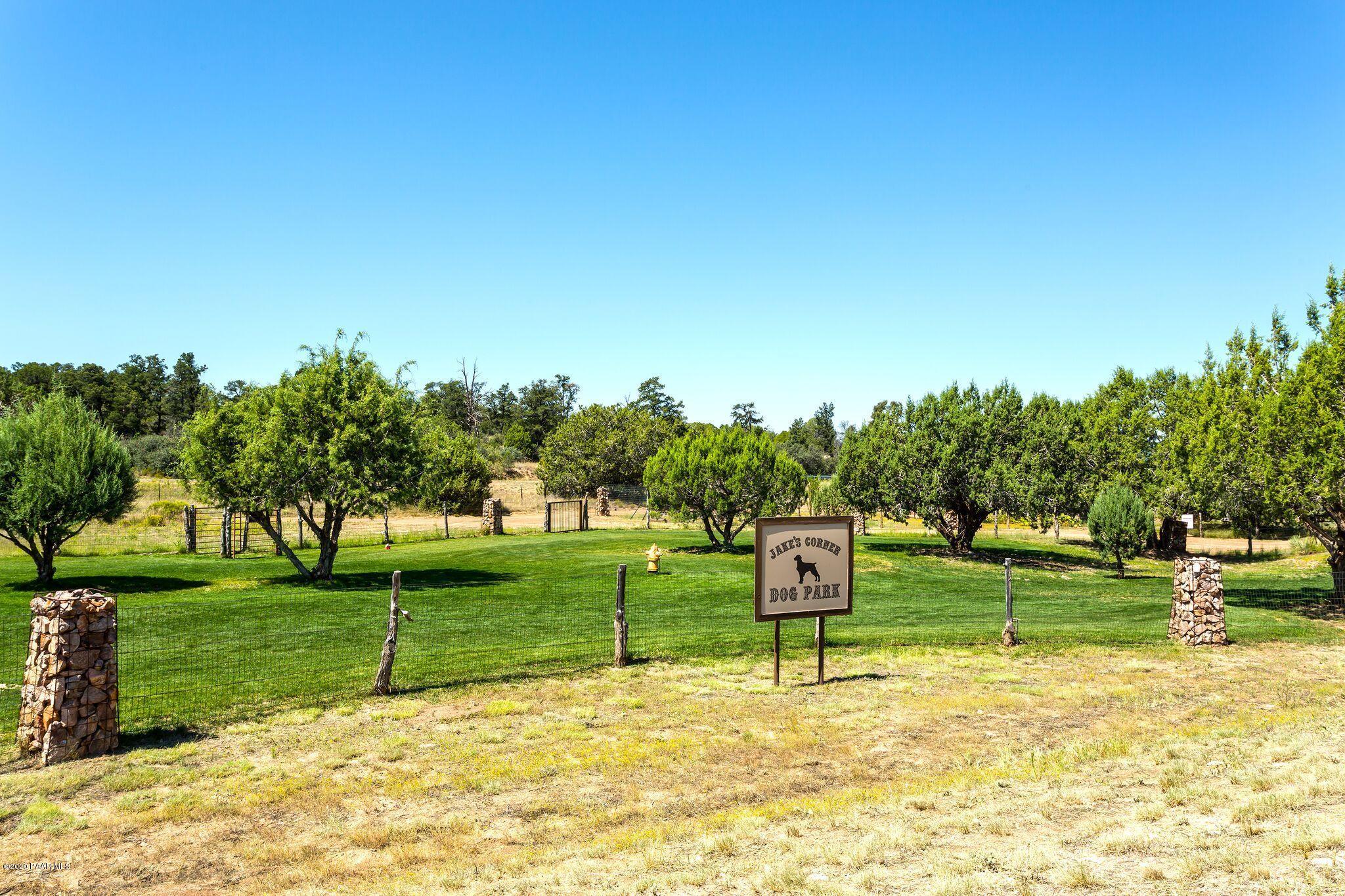 4930 West Sterling Ranch Road Prescott, AZ 86305 - Photo 20 of 22 a view of a park with large trees