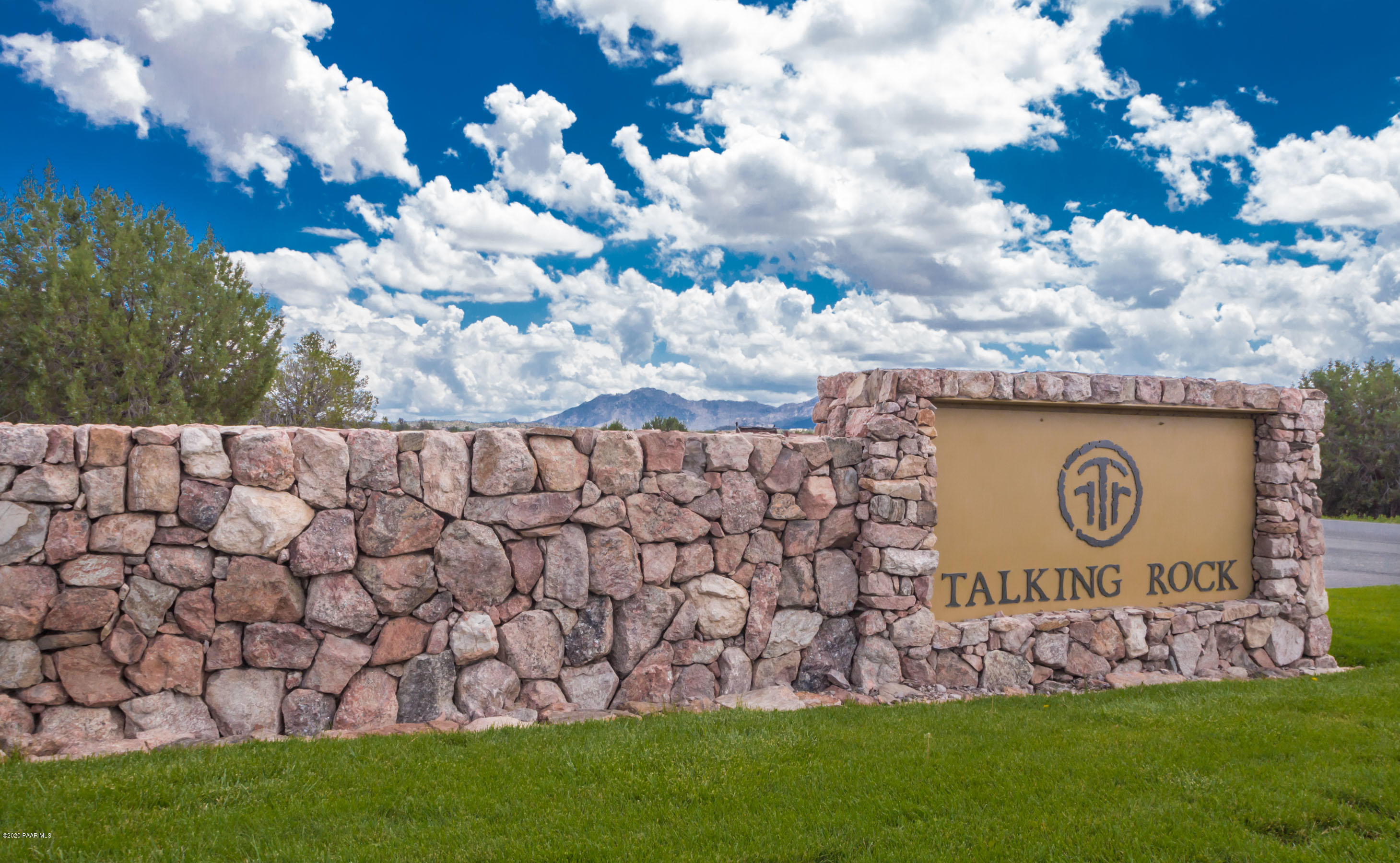 4930 West Sterling Ranch Road Prescott, AZ 86305 - Photo 5 of 22 a sign that is in front of the tree