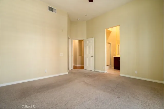 an empty room with a bathroom