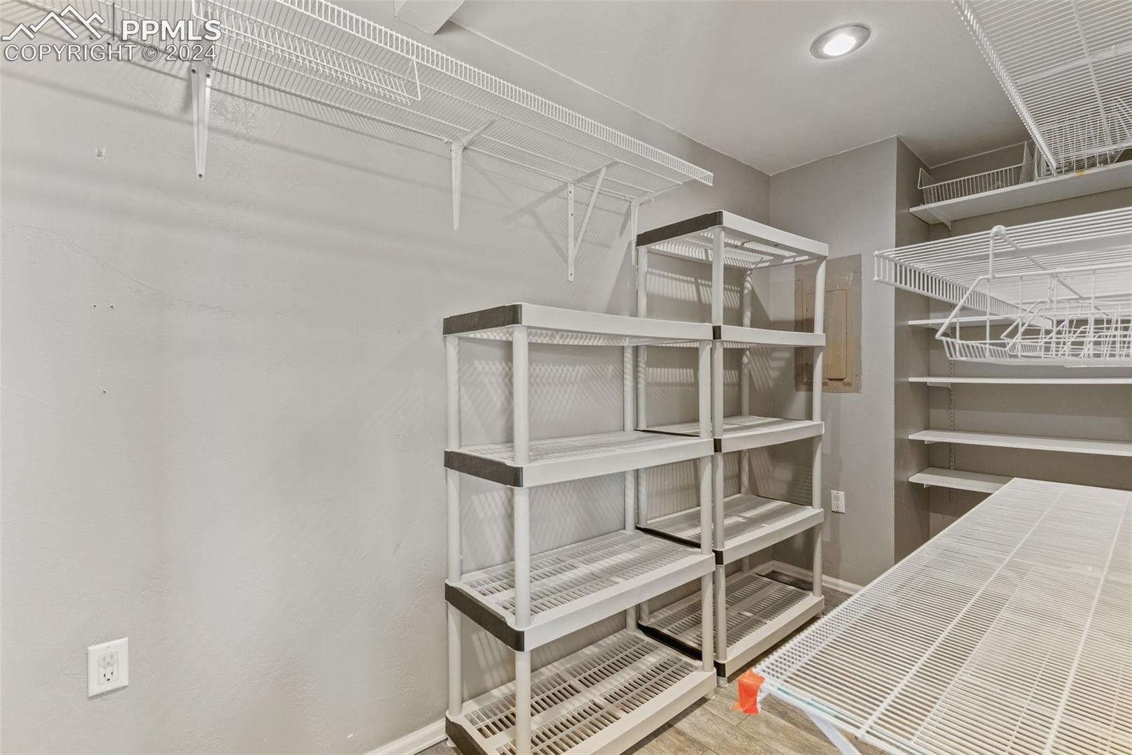 3830 Range View Road Monument, CO 80132 - Photo 26 of 50 Large kitchen pantry. Wine cooler refrigerator is on the left (outside of picture range).