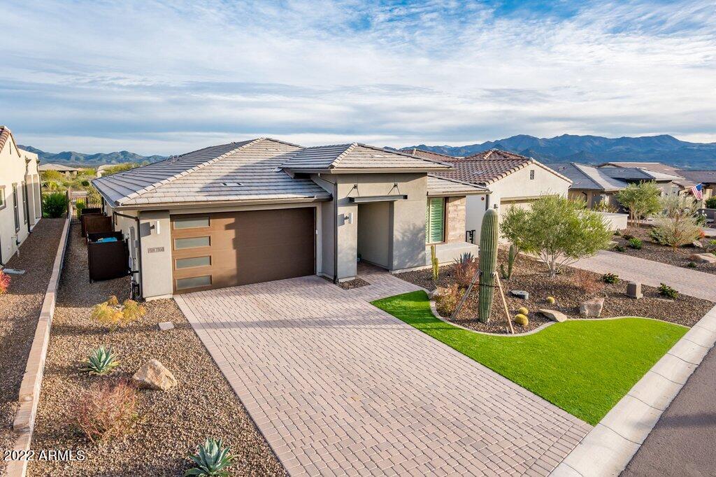 17860 East Cindercone Road Rio Verde, AZ 85263 - Photo 1 of 60 a front view of houses with yard