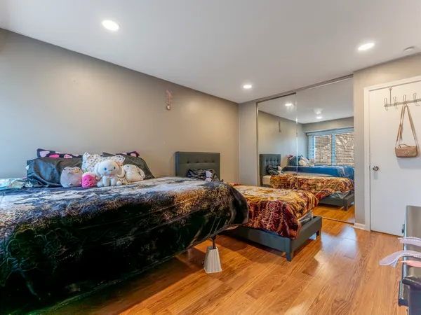 a bed room with bed and a tv