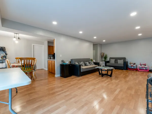 a living room with furniture and a table