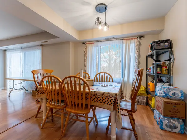 a view of a dining room with furniture