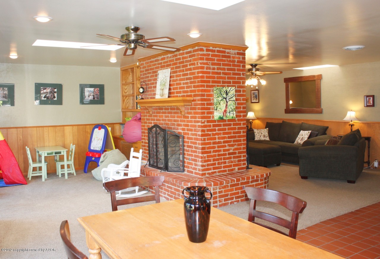 6104 Jameson Road Amarillo, TX 79106 - Photo 12 of 36 a living room with furniture and a couch