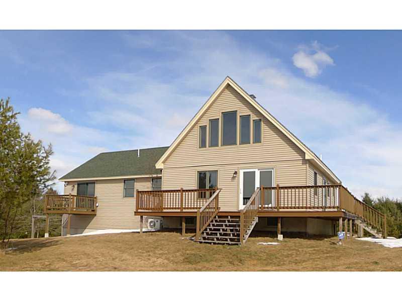 200 Warren Hill Road Jay, ME 04239 - Photo 33 of 35 Exterior Back. The windows capture...