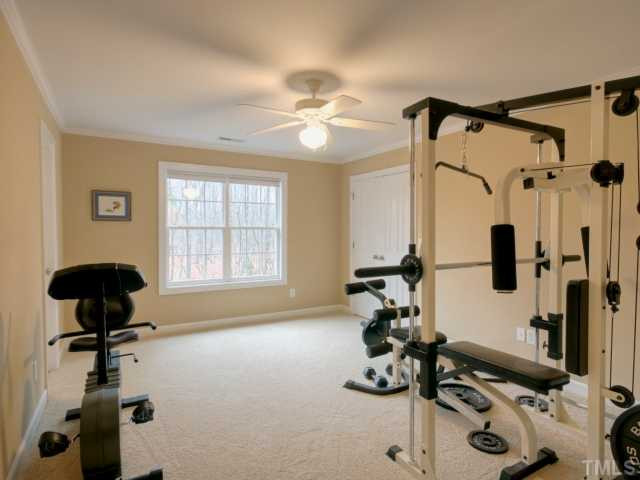 3 Highcross Court Raleigh, NC 27613 - Photo 20 of 25 The current owners of this home are using this bedroom as an exercise room. The buddy bath makes this perfect for all needs. Bedroom