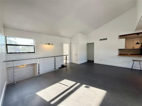 a view of a hallway with workspace