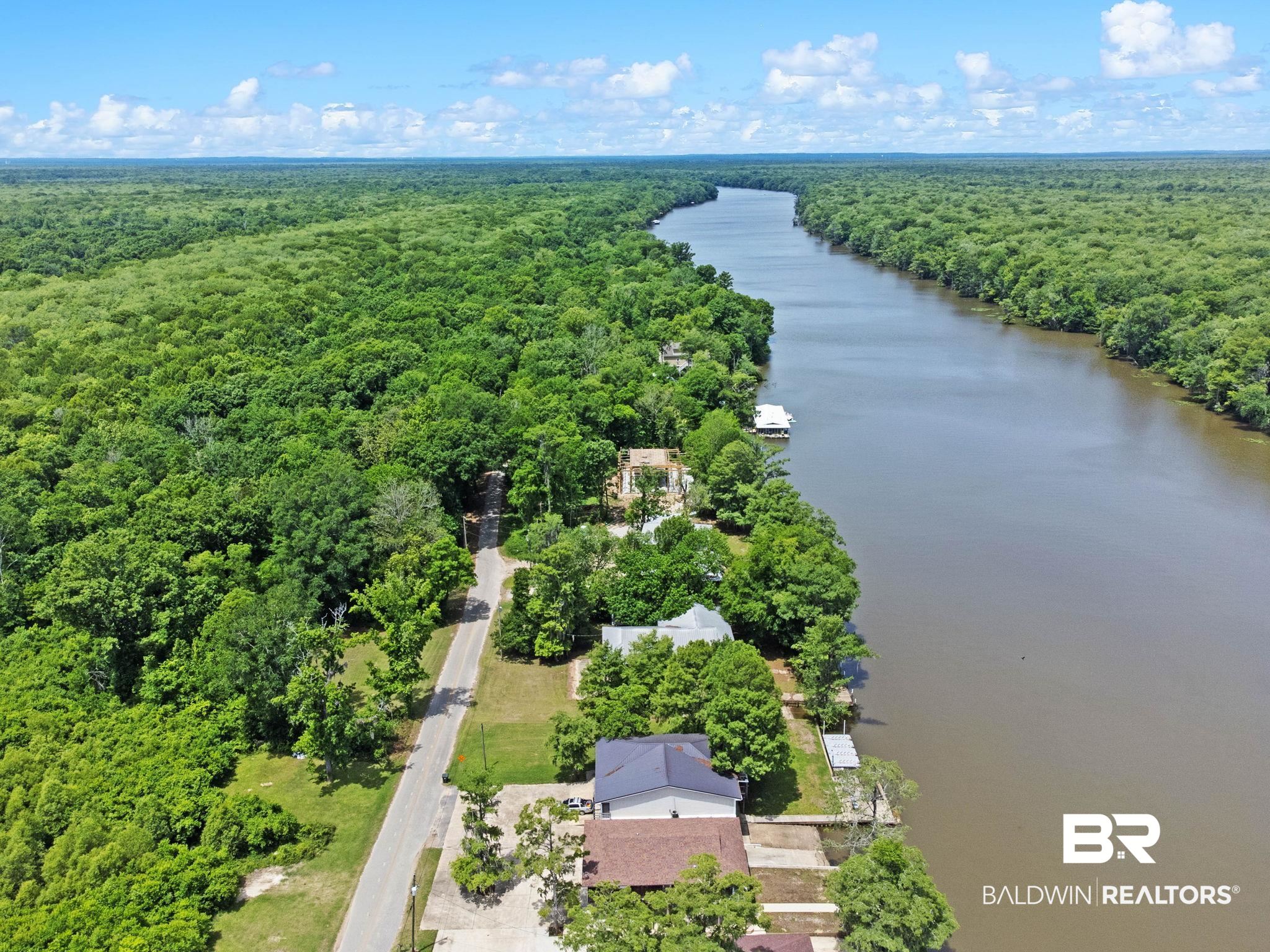 8153 Bryant's Lndg Road Stockton, AL 36579 - Photo 80 of 87 Riverfront property featuring a private dock and direct water access