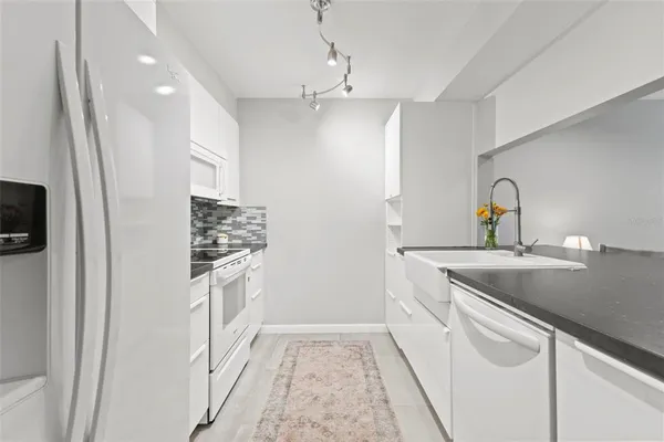 $320,000 | 1730 Belleair Forest Drive, Unit 1730, Belleair, FL 33756