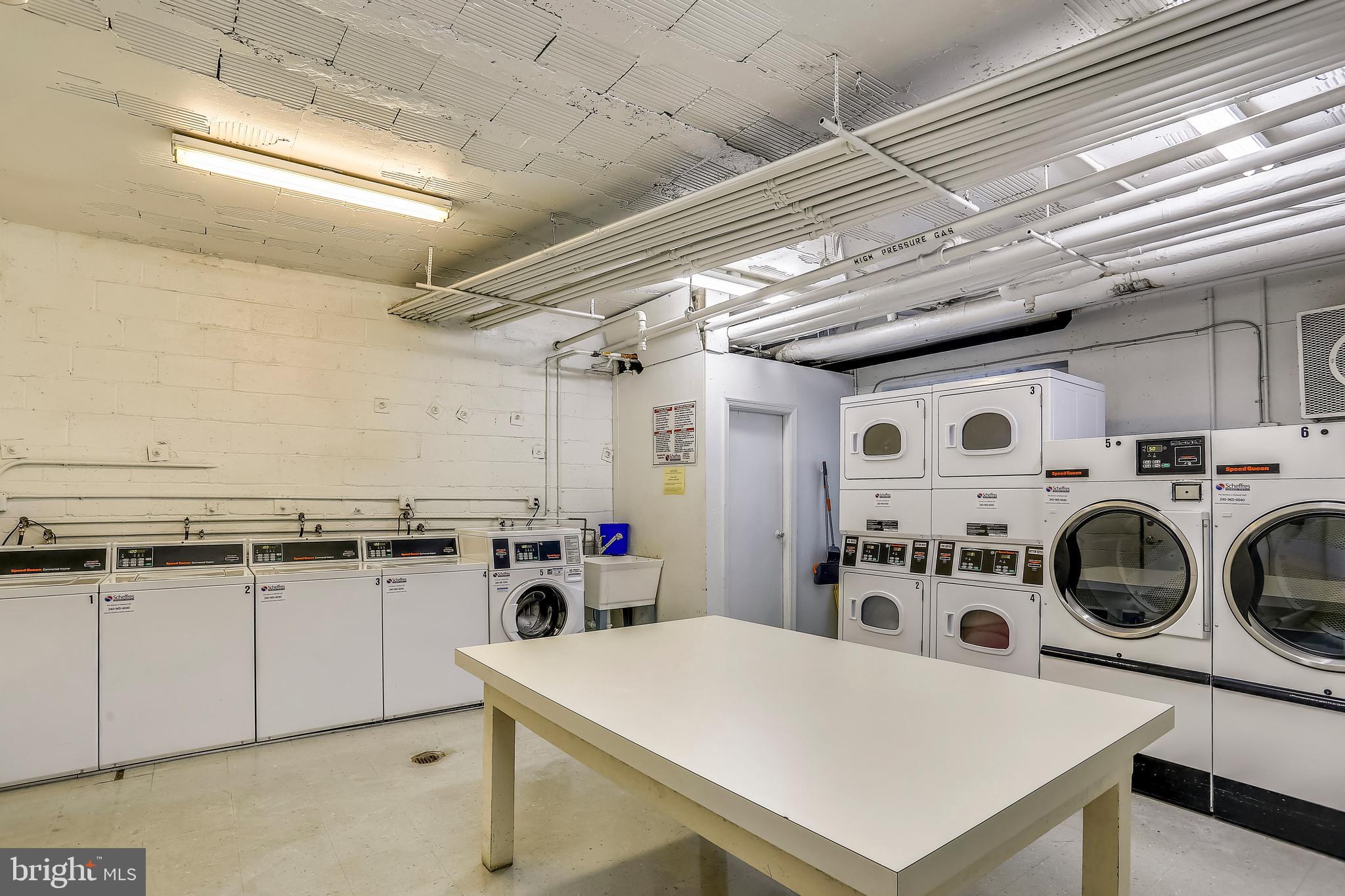 4100 W Street Northwest, Unit 515 Washington, DC 20007 - Photo 22 of 33 Common main level laundry room No yucky basement!