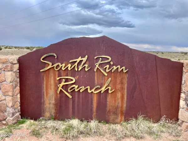 a sign that is on the wall of the building