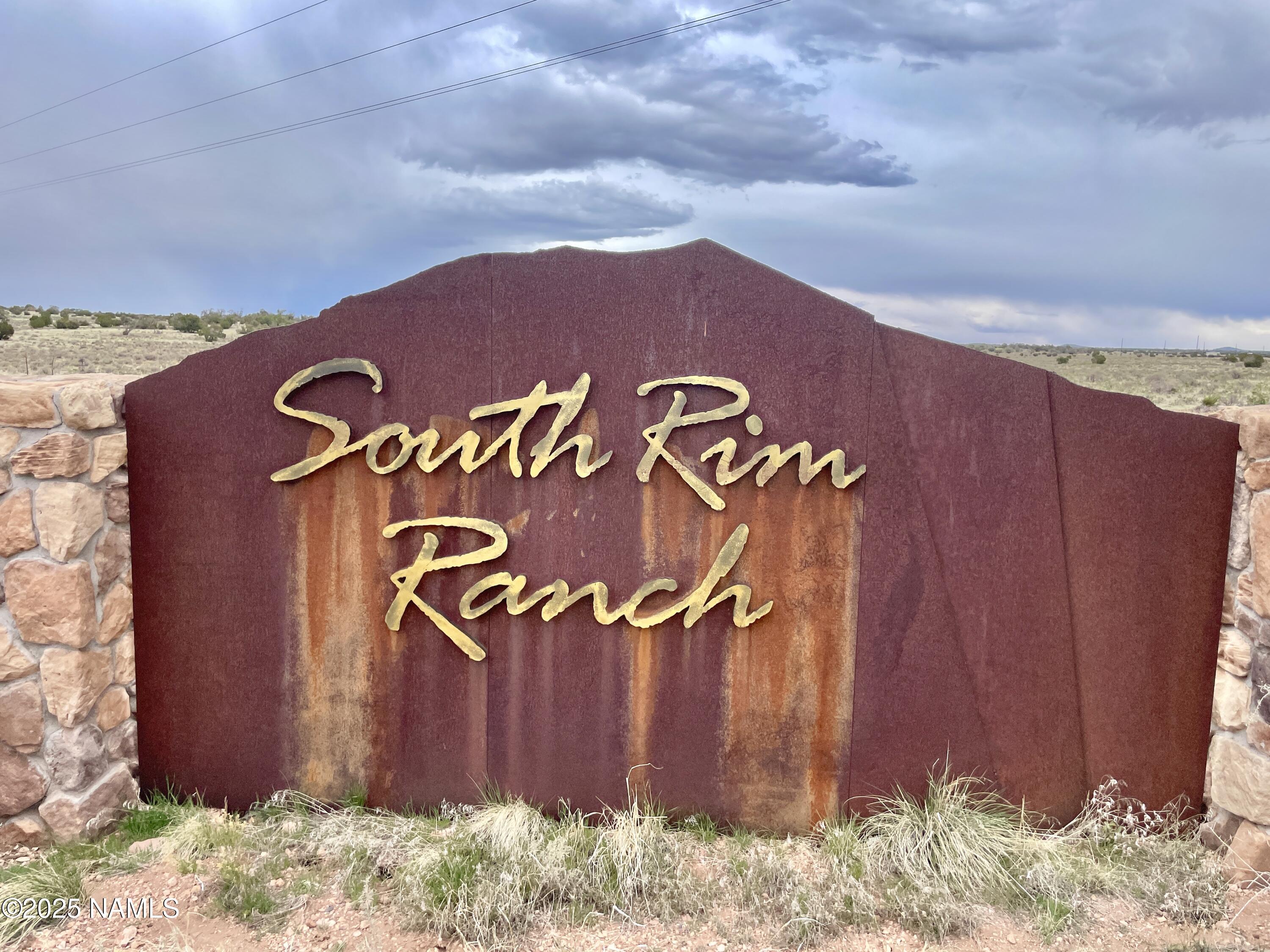 a sign that is on the wall of the building