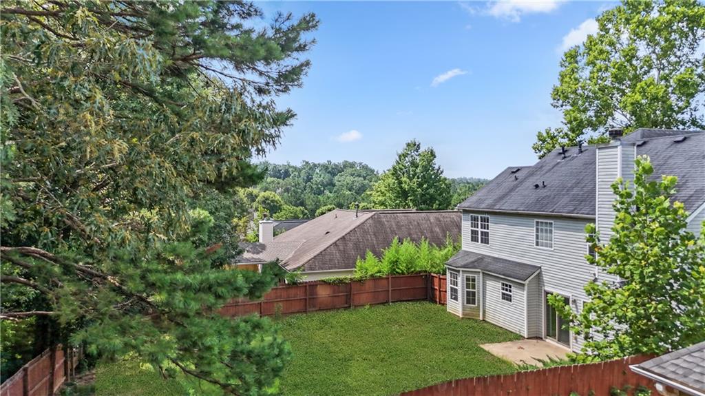 3740 Crescent Walk Lane Northeast Suwanee, GA 30024 - Photo 38 of 39 an aerial view of a house