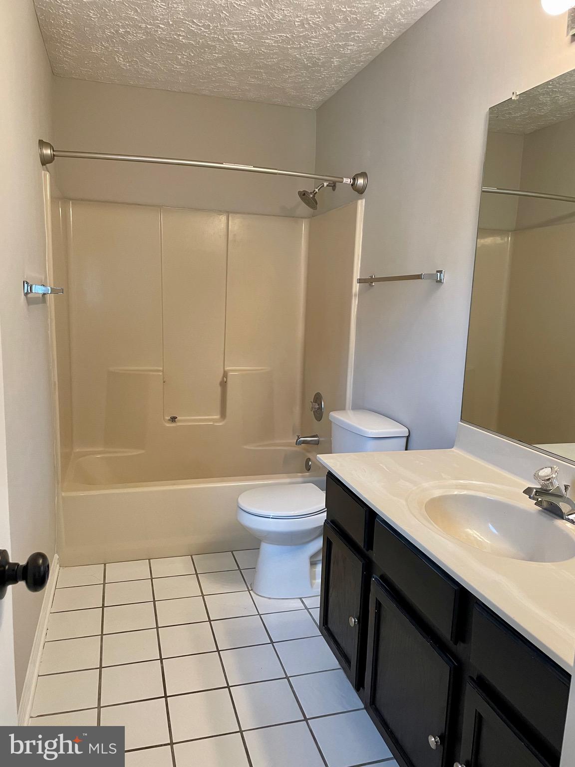 5126 Mallards Landing Drive King George, VA 22485 - Photo 17 of 19 a bathroom with a sink a toilet and shower
