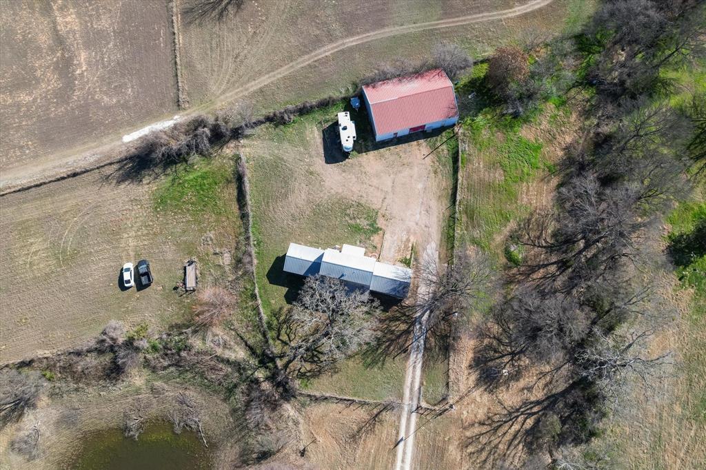 443 County Road 3799 Springtown, TX 76082 - Photo 32 of 33 an aerial view of a house with a yard