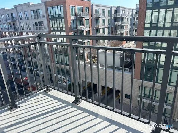 a view of a building from a balcony