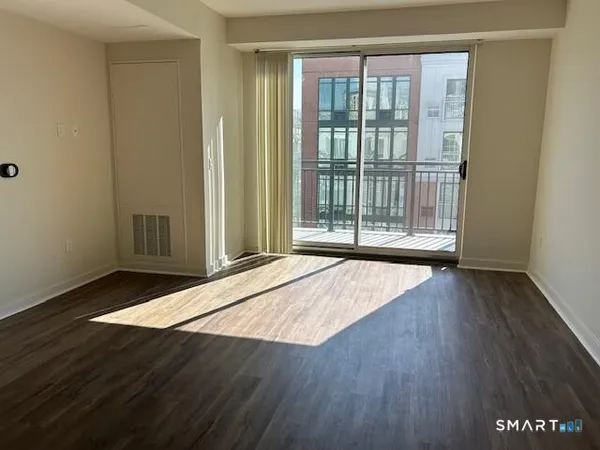 a kitchen with wooden cabinets and stainless steel appliances