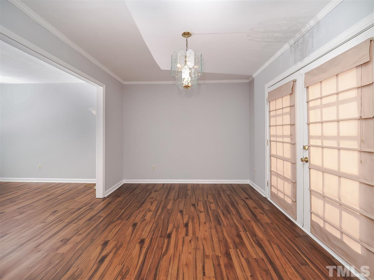 4401 Fox Road Raleigh, NC 27616 - Photo 14 of 20 wooden floor in an empty room with a window