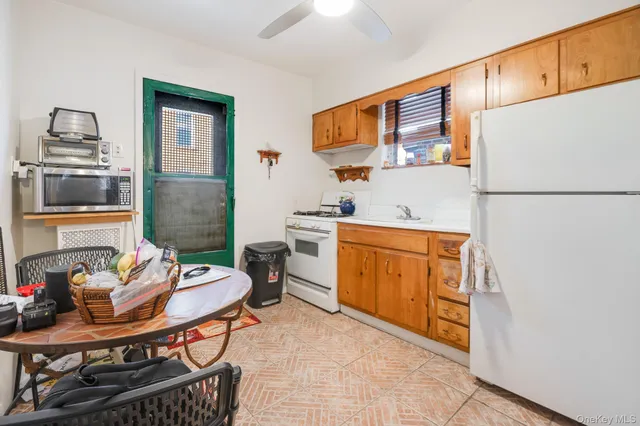 a kitchen with stainless steel appliances a stove and a refrigerator