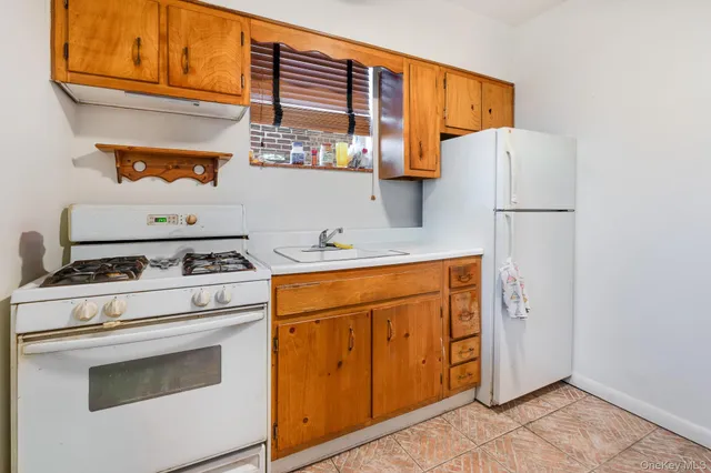 a view of a balcony and a street view