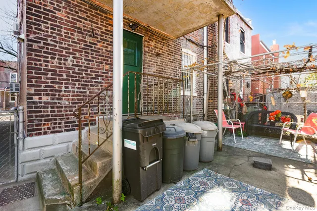 a backyard of a house with seating space