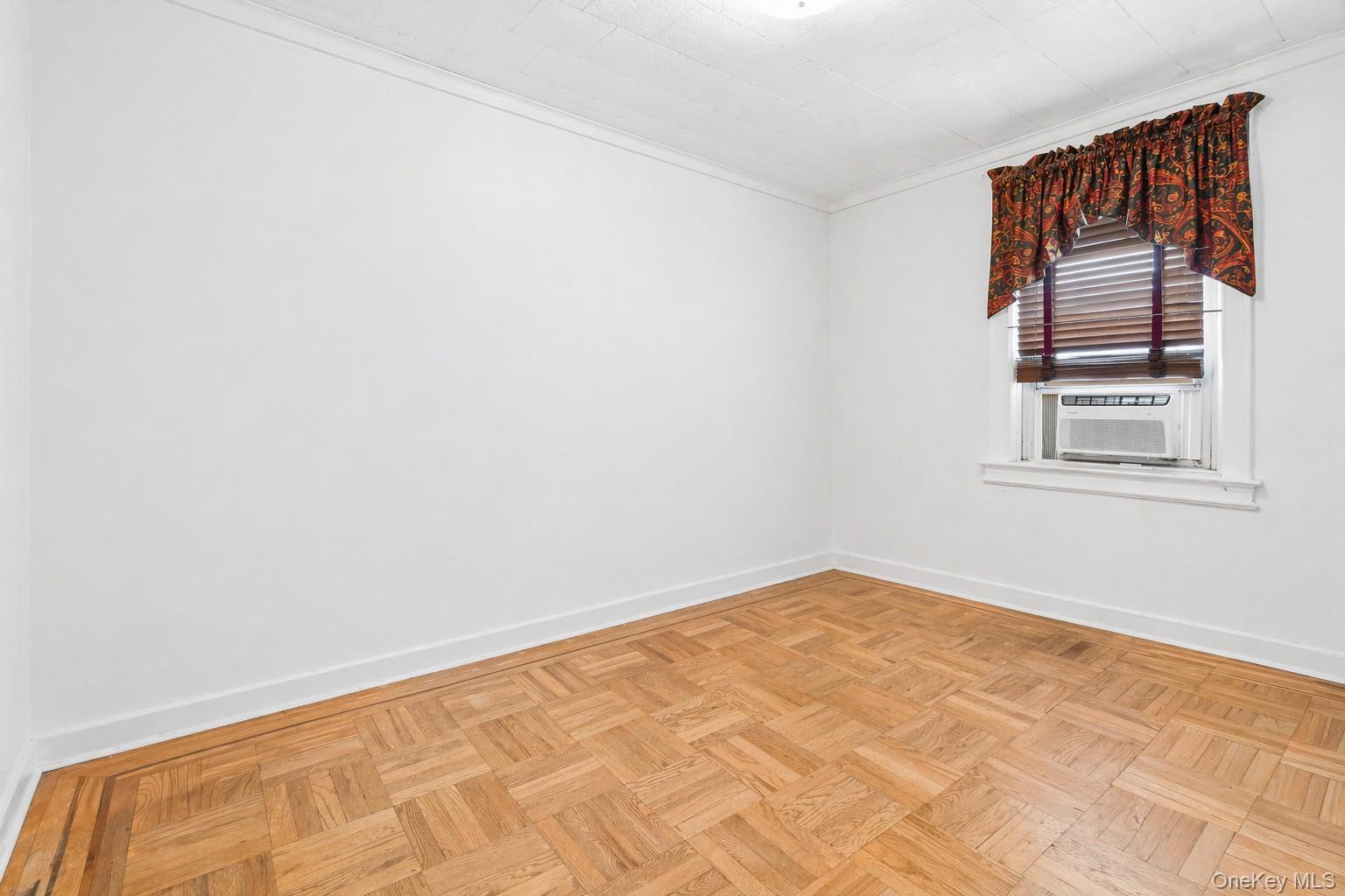 2437 Buck Street Bronx, NY 10461 - Photo 22 of 38 a view of empty room with window