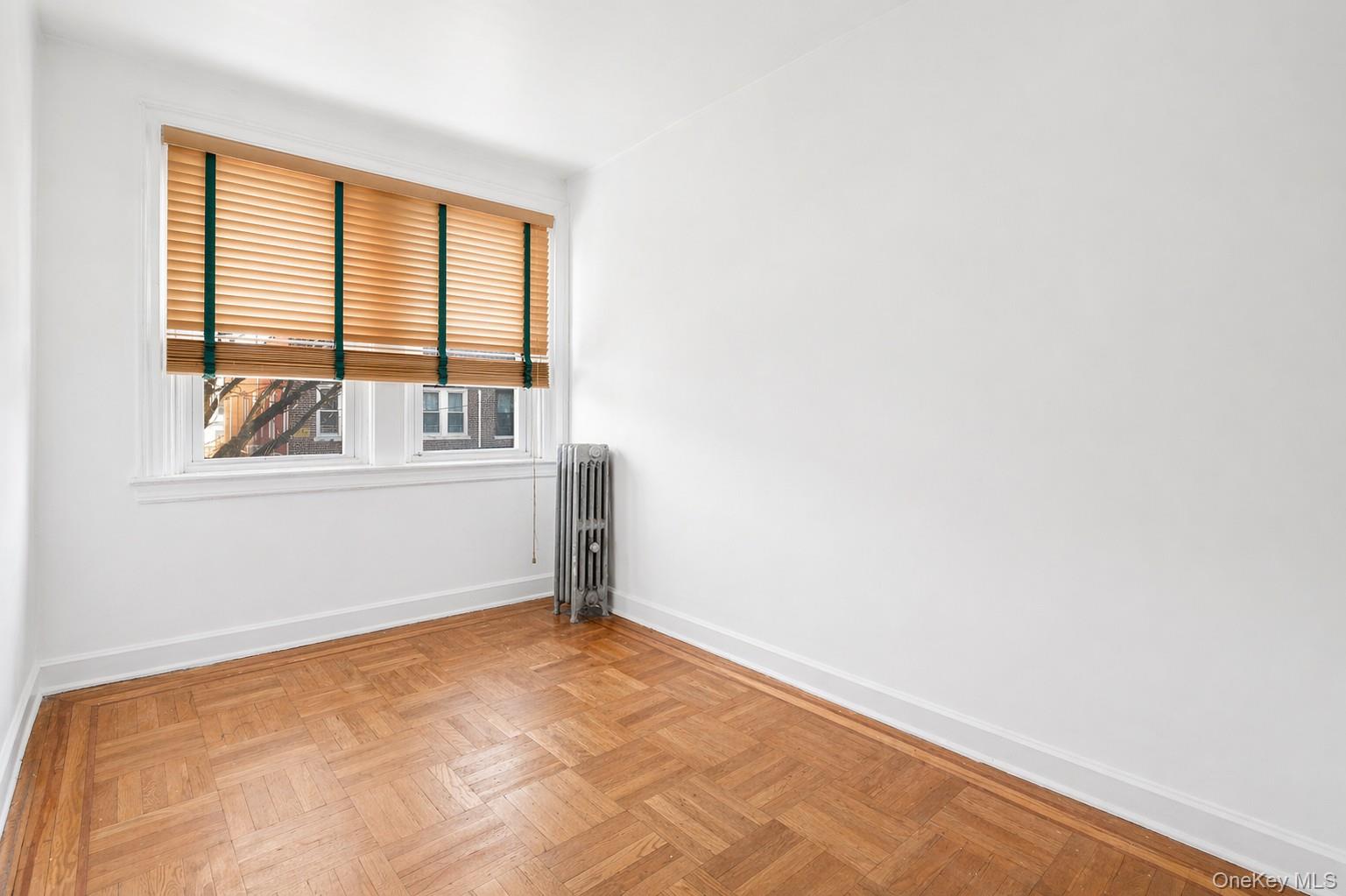 2437 Buck Street Bronx, NY 10461 - Photo 23 of 38 a view of an empty room with a window