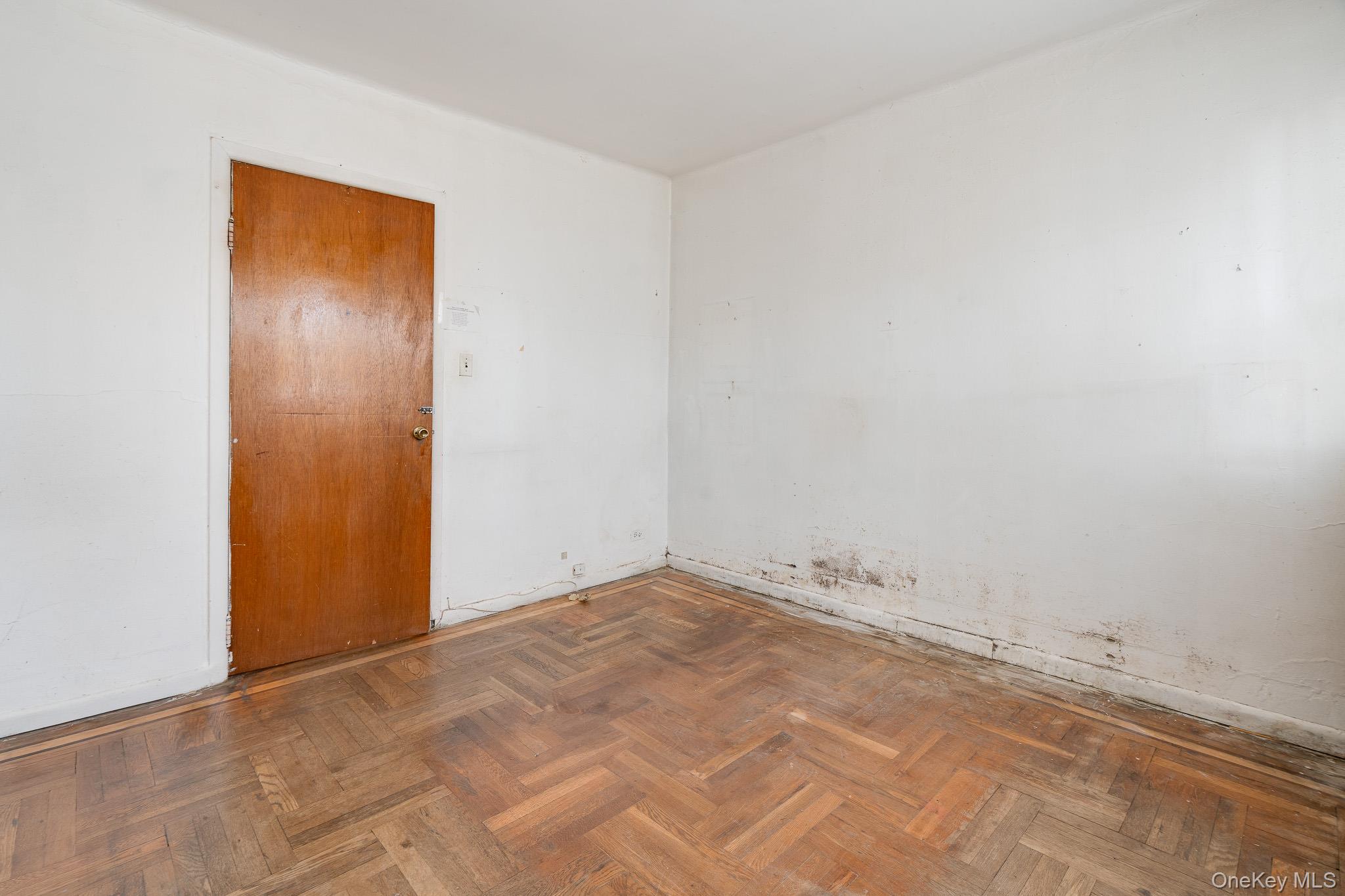 2437 Buck Street Bronx, NY 10461 - Photo 24 of 38 an empty room with an entryway