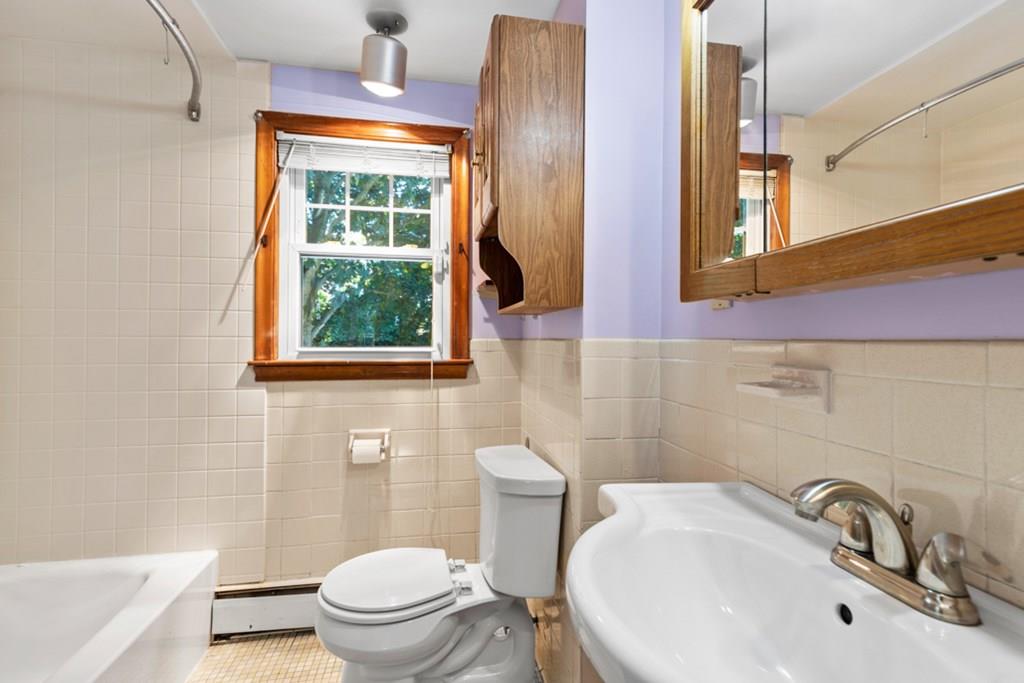 19 Ronald Road Arlington, MA 02474 - Photo 20 of 28 a bathroom with a sink and a toilet