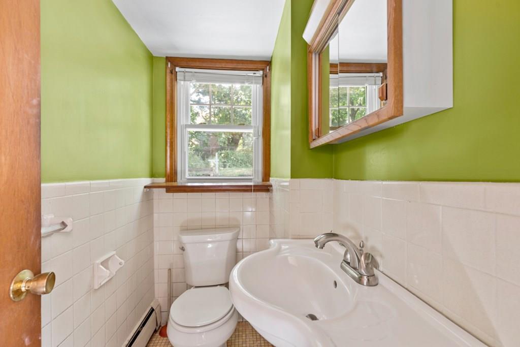 19 Ronald Road Arlington, MA 02474 - Photo 21 of 28 a bathroom with a sink and a bathtub