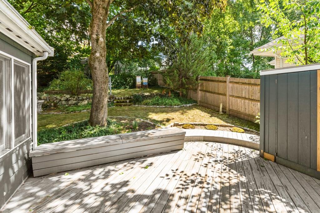 19 Ronald Road Arlington, MA 02474 - Photo 26 of 28 a view of backyard with wooden fence and large trees