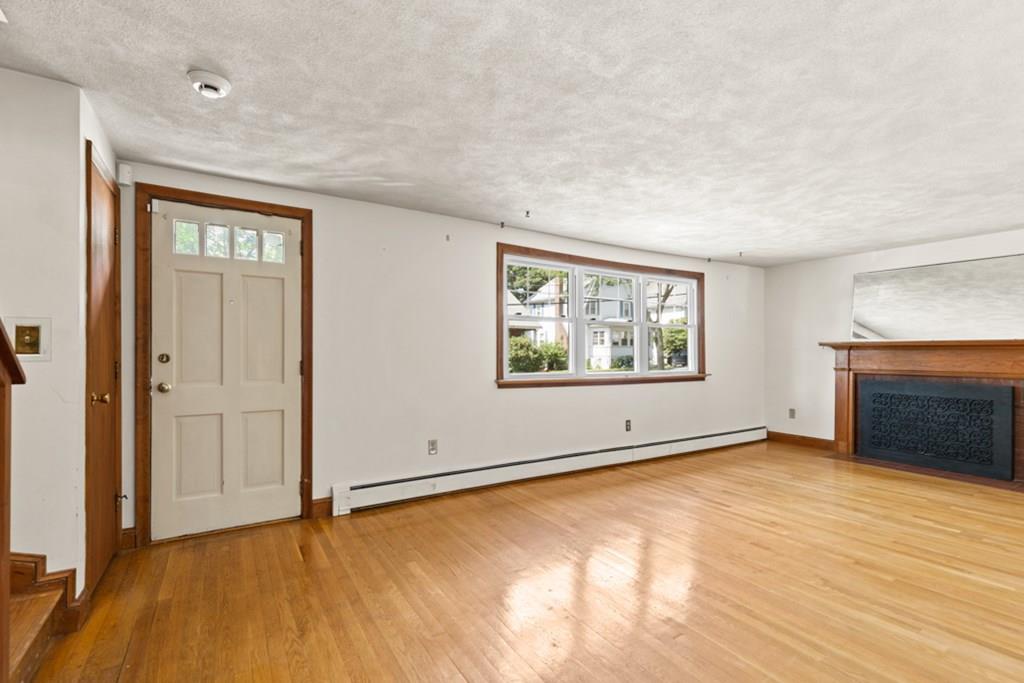 19 Ronald Road Arlington, MA 02474 - Photo 4 of 28 an empty room with window
