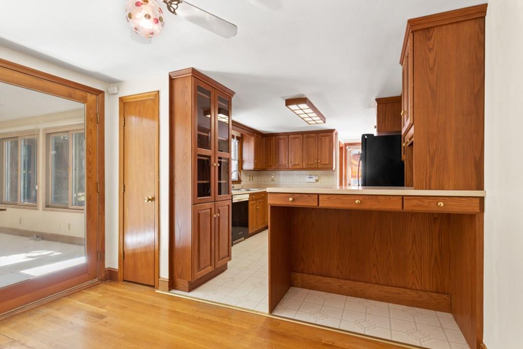 19 Ronald Road Arlington, MA 02474 - Photo 7 of 28 a view of a kitchen with wooden floor and a kitchen