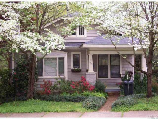 1928 Alexander Road Raleigh, NC 27608 - Photo 1 of 1 front view of a house with a yard