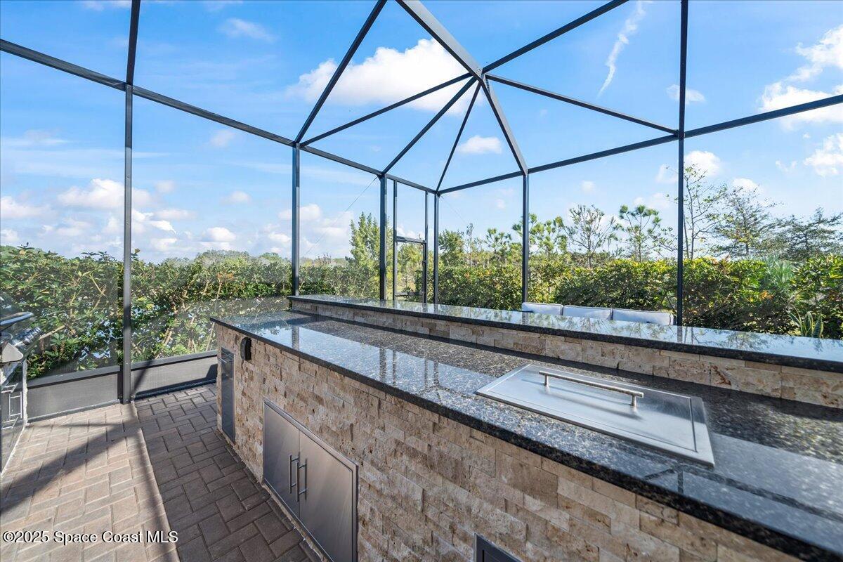 2190 Caravan Place Melbourne, FL 32940 - Photo 15 of 46 a view of a city from a balcony