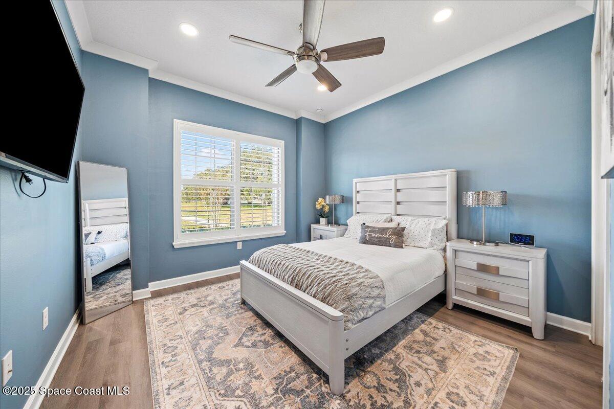 2190 Caravan Place Melbourne, FL 32940 - Photo 35 of 46 a bedroom with a bed and a window