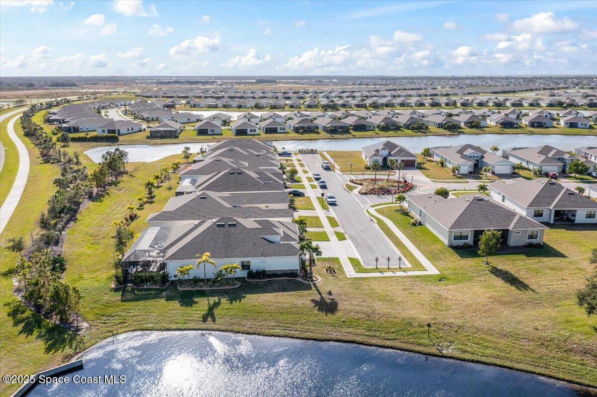 2190 Caravan Place Melbourne, FL 32940 - Photo 42 of 46 an aerial view of residential houses with outdoor space and swimming pool